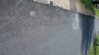 Baru Saja Dinikmati Warga, Jalan Aspal Desa Woro Kepohbaru Sudah Retak