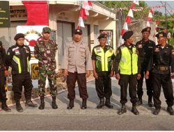 Linmas Desa Jono Temayang Siap Siaga Jaga Kelancaran Lalu Lintas Peringatan HUT RI ke 80